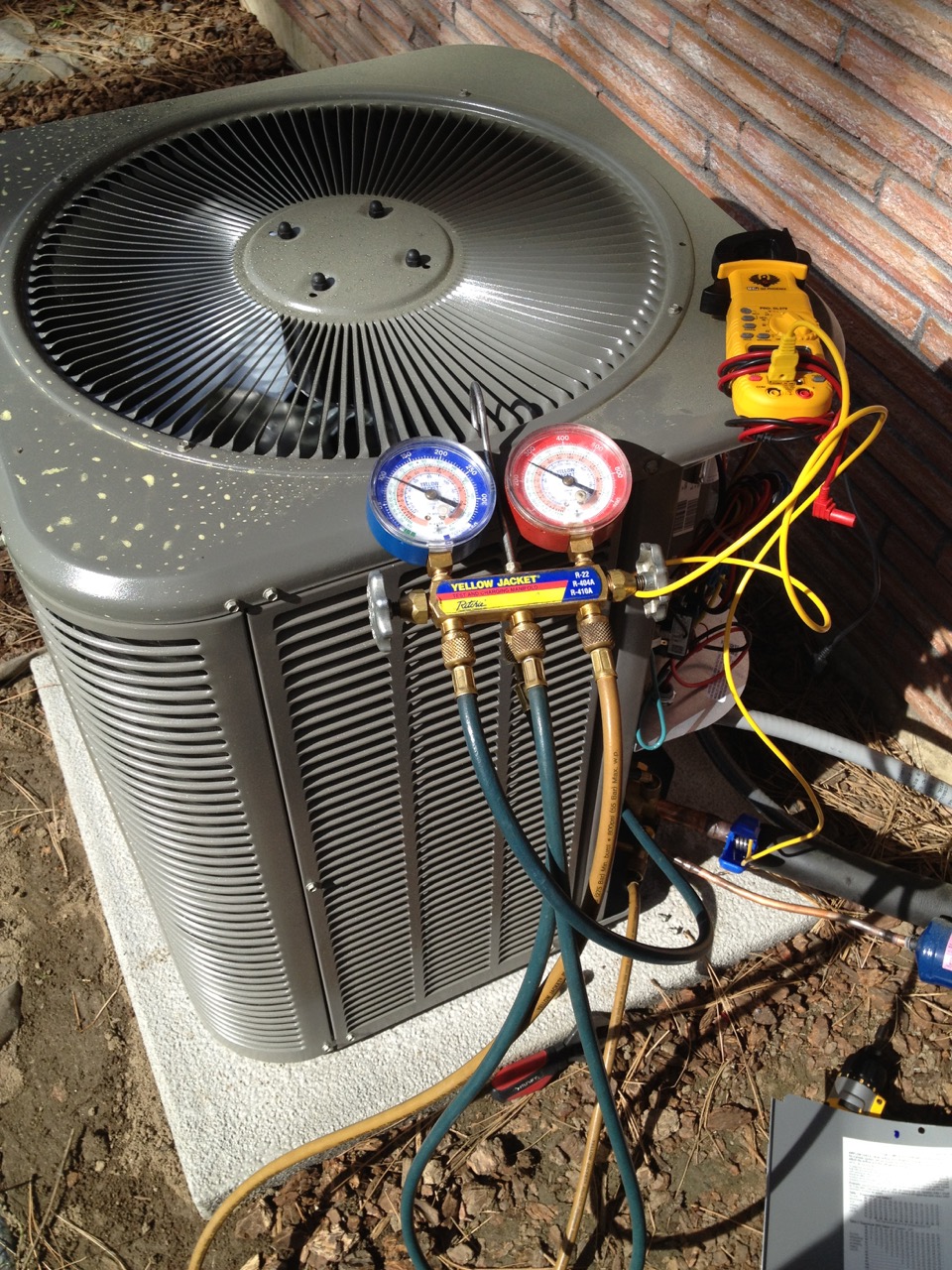 air-conditioner-being-serviced-by-revive-heating-and-air-conditioner